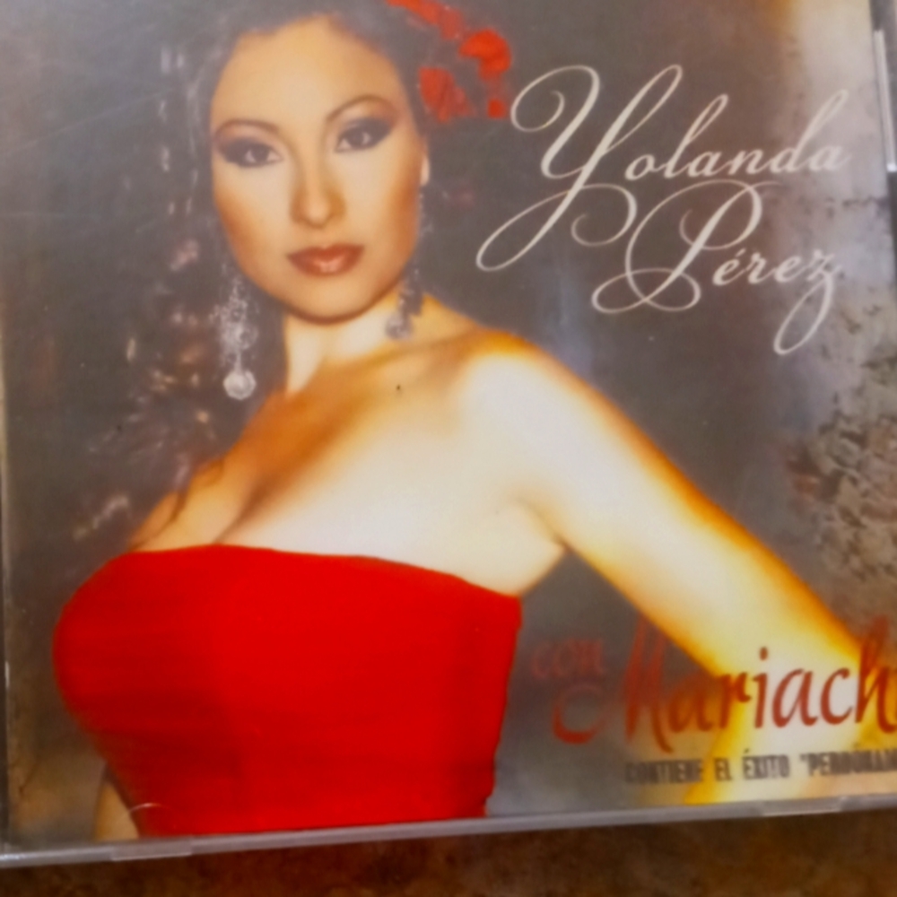 Yolanda Pérez Red Strapless Dress Album Cover